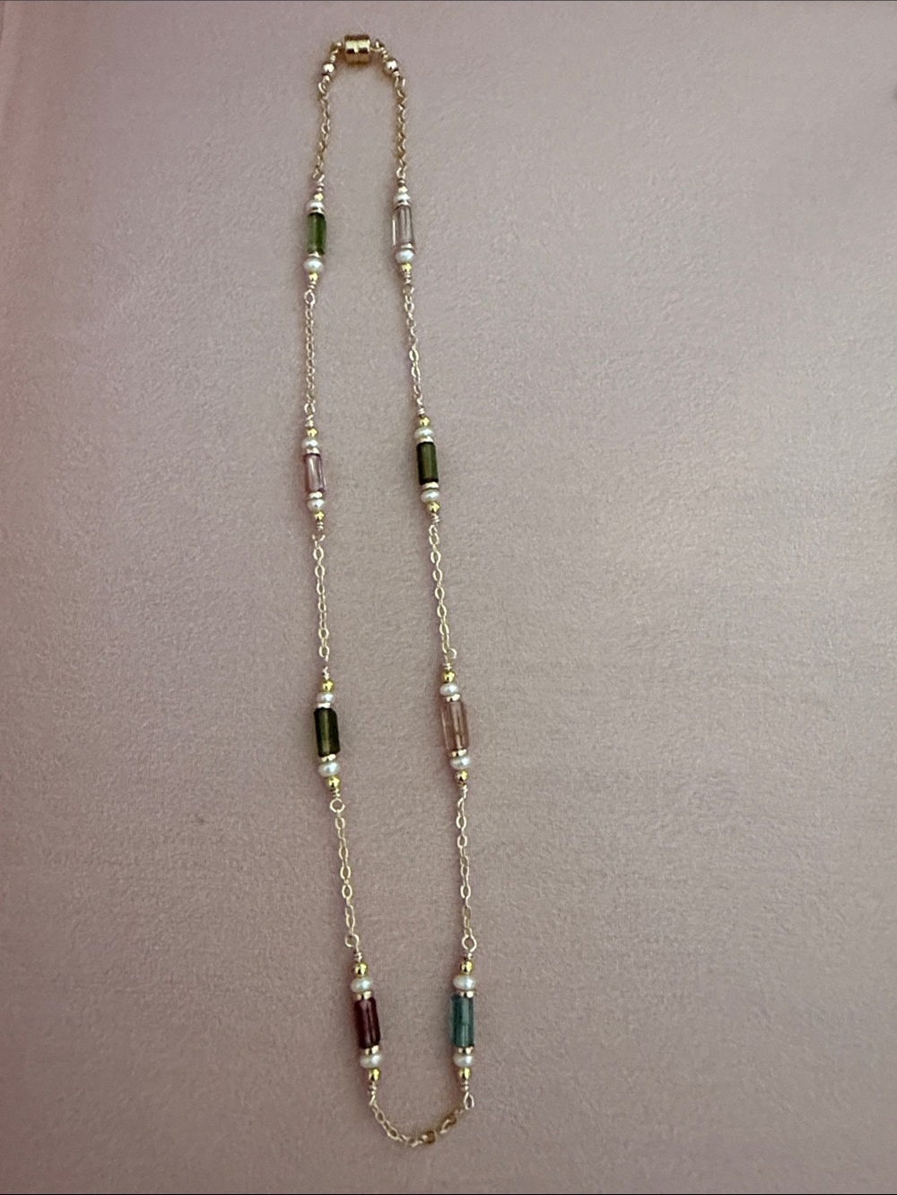 Gold filled chain joined together with watermelon tourmaline and pearl gemstones